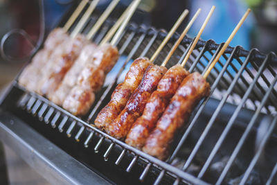 Close-up of meat on barbecue grill