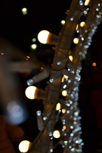 Low angle view of illuminated christmas lights