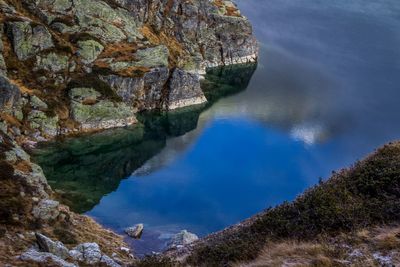 High angle view of rocks by sea