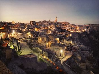 High angle view of illuminated buildings in city