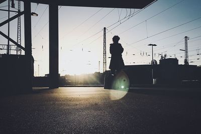 Silhouette man against clear sky