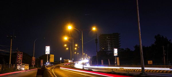 Light trails on road at night