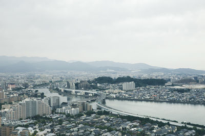 High angle view of cityscape against sky