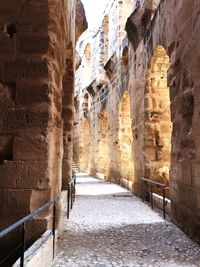 Narrow alley amidst old ruins