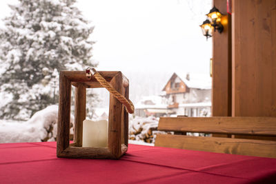 Close-up of cross on table