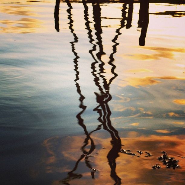 water, reflection, sunset, silhouette, sea, tranquility, beach, sky, nature, shore, beauty in nature, lake, waterfront, rippled, scenics, tranquil scene, puddle, outdoors, wet