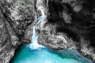 Close-up of water flowing through rocks