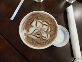 High angle view of cappuccino on table