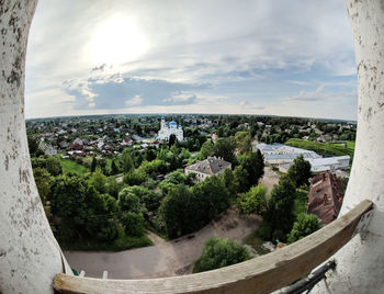 Panoramic shot of city by sea against sky