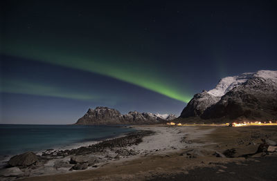 Scenic view of sea against sky at night