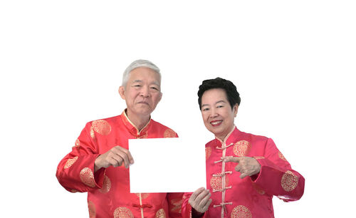 Portrait of smiling young man against white background