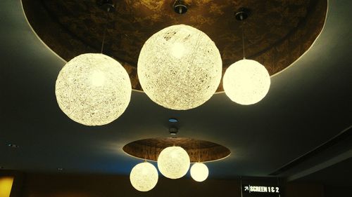 Low angle view of illuminated ceiling