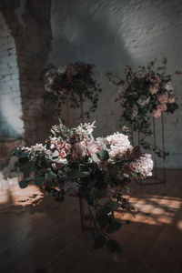 Flower vase on table