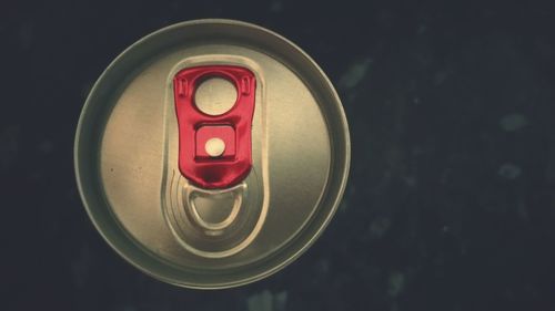 Close-up of drink can on table