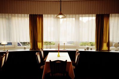 Empty chairs and table in restaurant