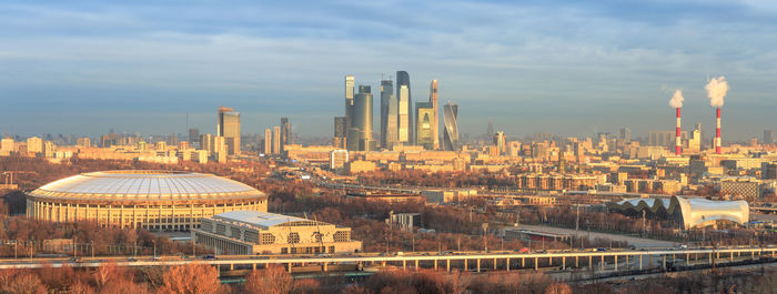 Modern buildings in city against sky