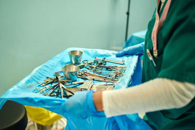 Close-up of hands on table