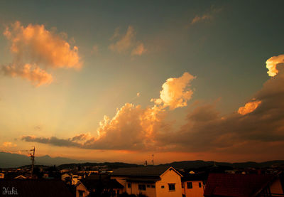 View of residential buildings at sunset