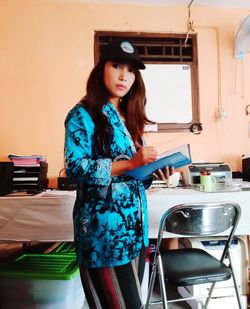 Woman standing at home