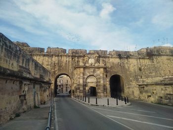 View of historical building against cloudy sky