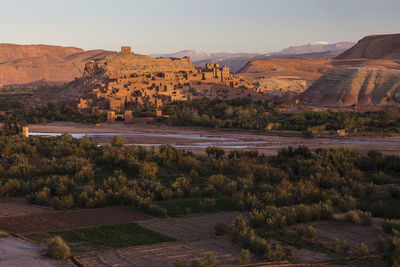 Scenic view of landscape and mountains against sky