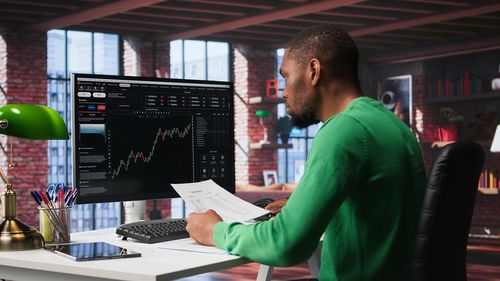Man using calculator