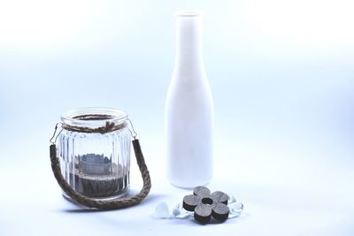 Close-up of eyeglasses on table against white background