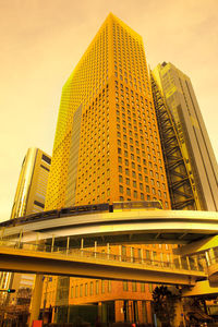 Low angle view of modern building against clear sky