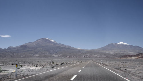 Scenic view of mountain road against sky