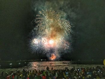 Firework display at night