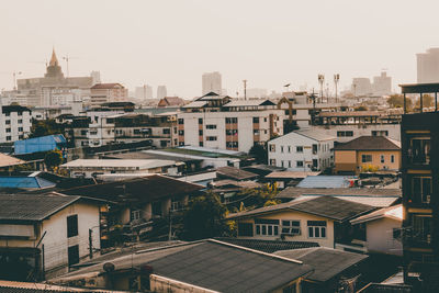 High angle view of buildings against clear sky