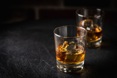 Close-up of drinking glass on table