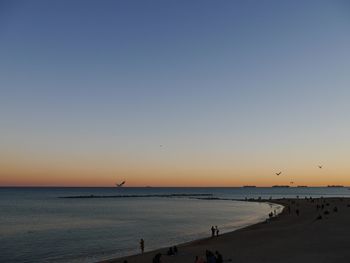 View of beach at sunset