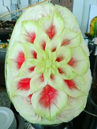 Close-up of red fruit in plate