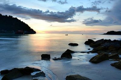 Scenic view of sea at sunset