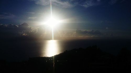 Scenic view of silhouette landscape against sky at sunset