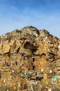 Low angle view of rock formations