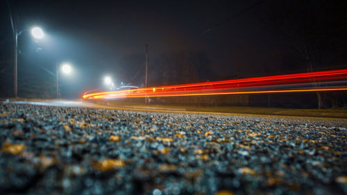 Light trails on road at night