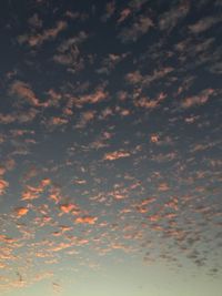 Low angle view of clouds in sky during sunset