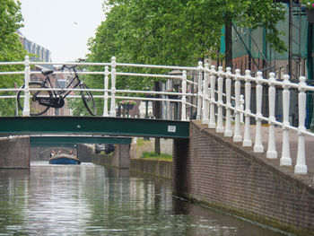 View of people in park by canal