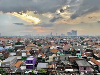 High angle view of townscape against sky at sunset