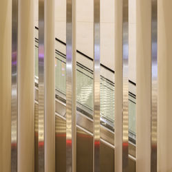 Escalator seen through window