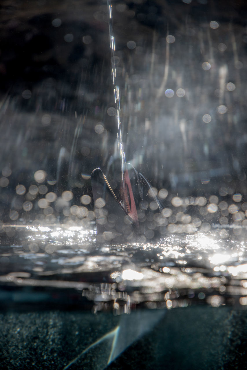 CLOSE-UP OF WATER SPLASHING ON FOUNTAIN