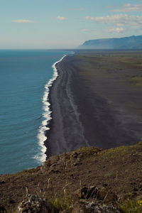 Empty beach with basalt sand landscape photo