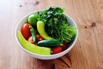 Vegetables in bowl on table