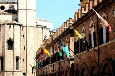 Low angle view of buildings against clear sky