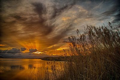 Scenic view of dramatic sky during sunset