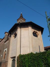 Low angle view of building against clear blue sky