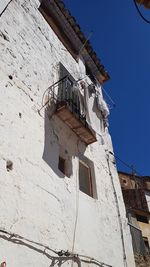 Low angle view of old building against sky