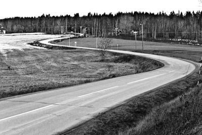 Road passing through field